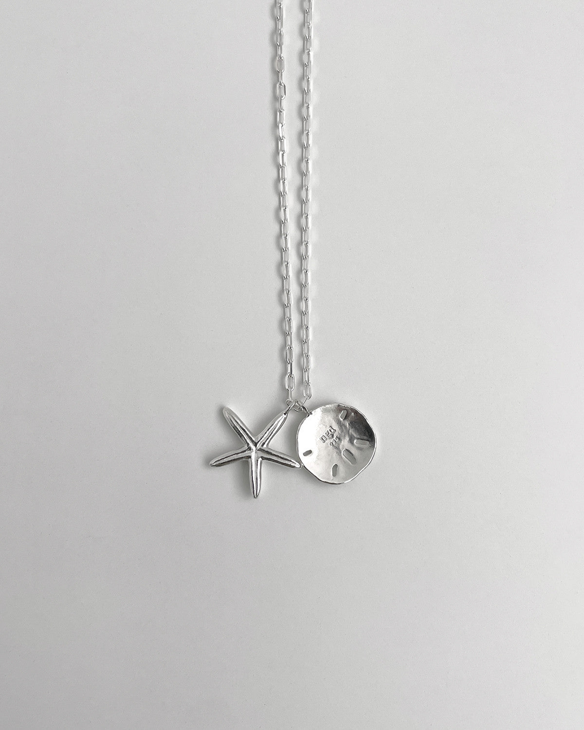 starfish & sand dollar necklace - Next Green Door - CAVA LIFE